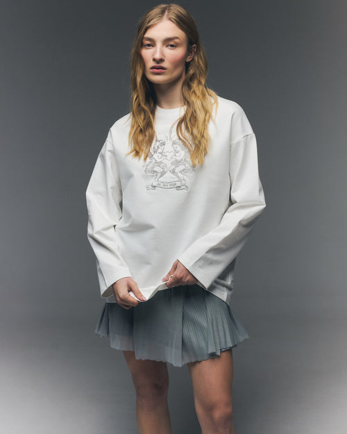 Лонгслів молочний «Let love reign»