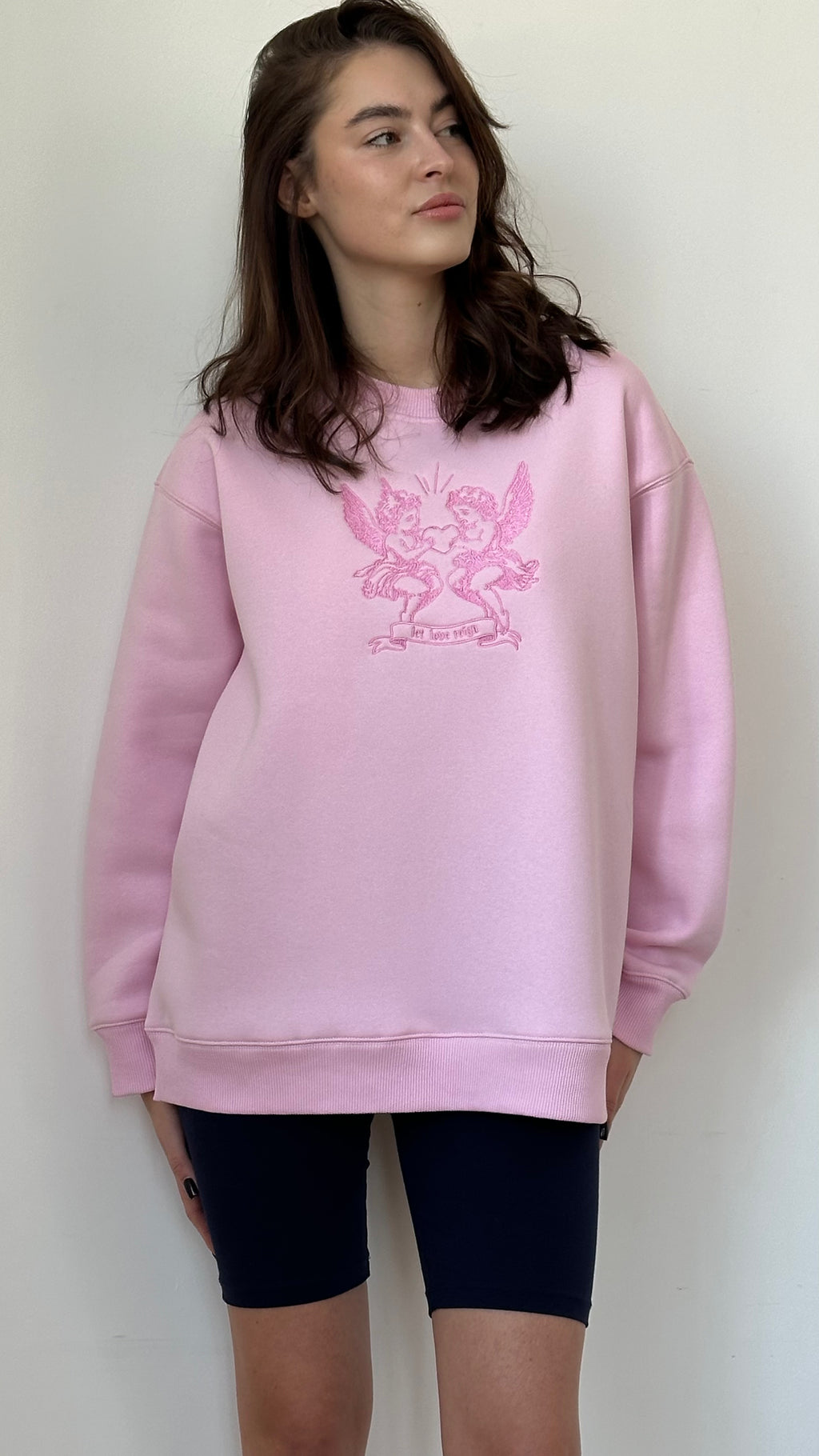 Світшот рожевий "Let love reign"